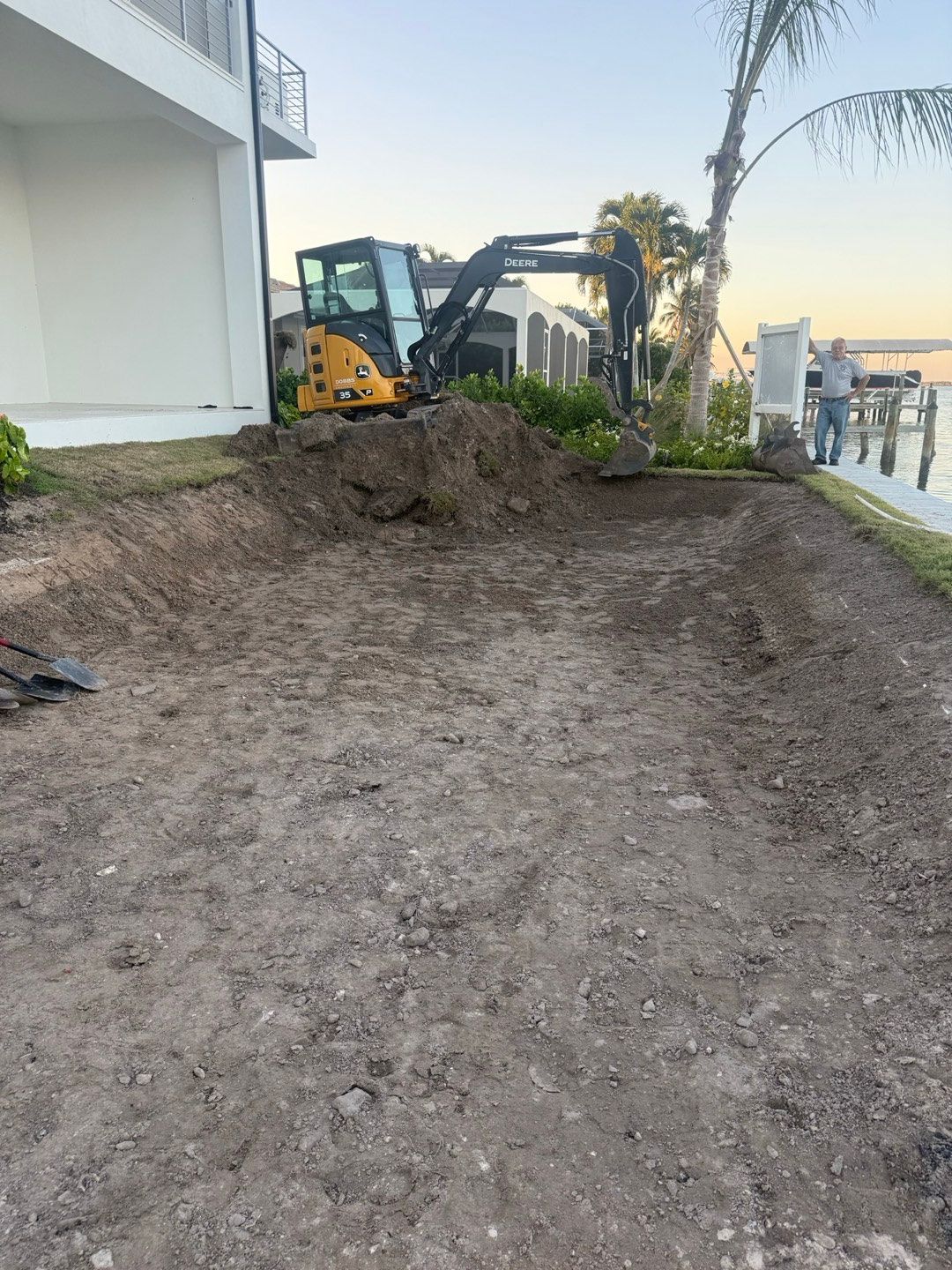Waterfront property during excavation and grading before the landscape installation was completed